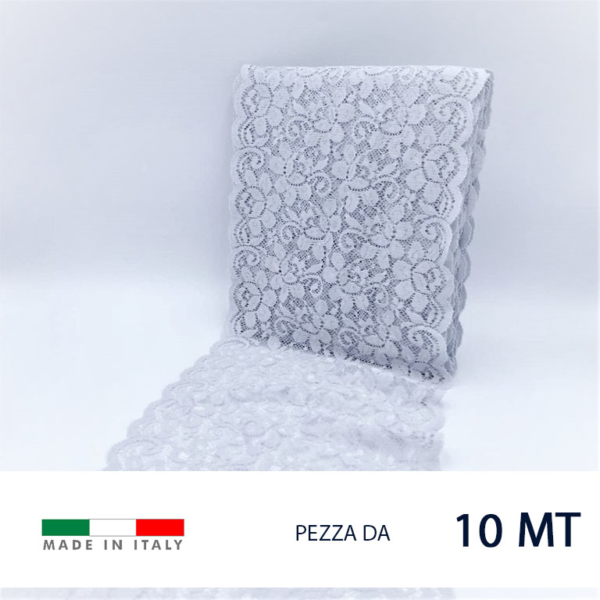 Pizzo raschel elastico con motivo floreale. 80% poliammide e 20% elastam. Prezzo riferito alla confezione da 10 metri. Altezza  5,5 cm circa. Prodotto in Italia.